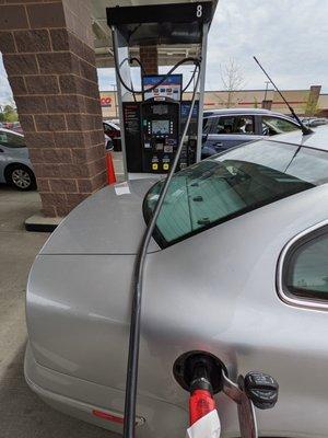 Filling up at pump 8. Notice how the hose goes over my car even though my gas cap is on my passenger side and the pump was on driver side.