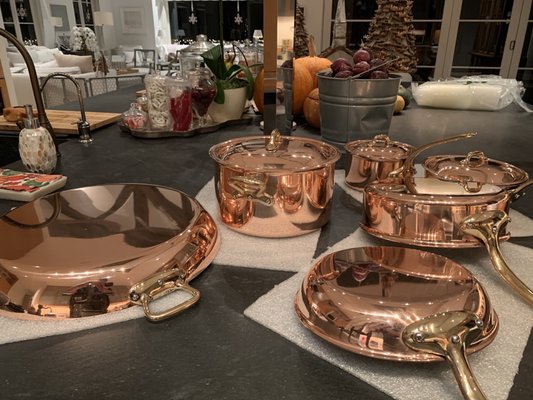 Copper pots pans and lids...