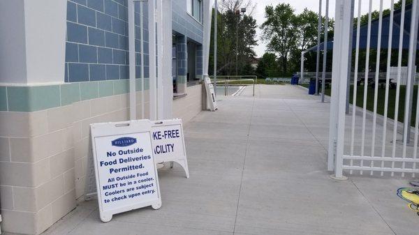 Front entrance with signs