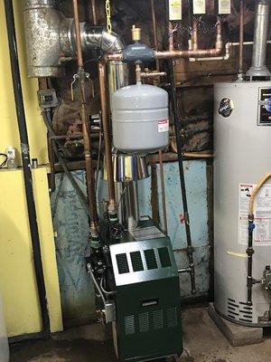 Installed a new boiler with zone valves, thermostats, air vents, expansion tank, back flow preventer with pressure reducing valve.