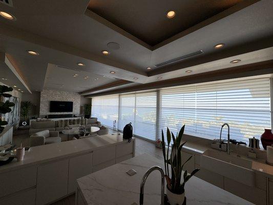 Hunter Douglas hardwire powered Luminette shades integrated with Control 4 home automation.