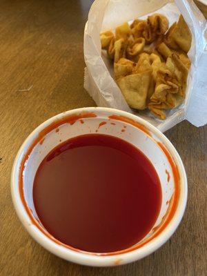 Crab Rangoon with sweet n sour sauce