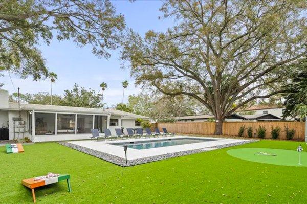 Full Backyard of Artificial Turf with Two Hole Putting Green