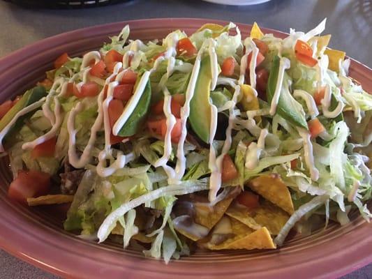 Steak Nachos (my favorite). Just add some lime and a bit of their cheese and this is amazing. $8.99