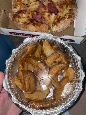 The potato wedges container is literally bigger than the pizza. Potato wedges can soggy and wet.