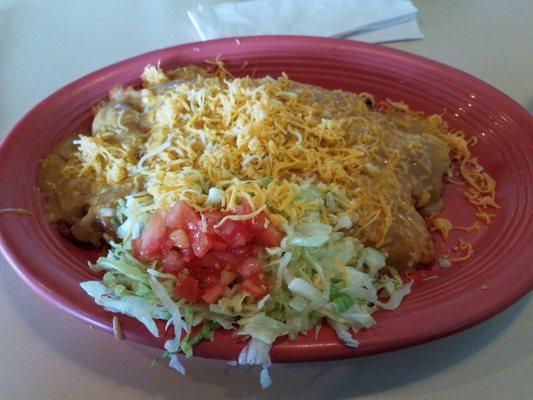 Smothered chicken enchilada