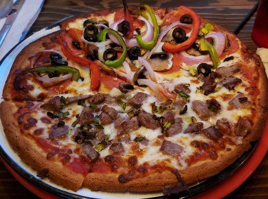 Cauliflower Crust Pizza, half Supreme, half Hidden Meat (carne asada)