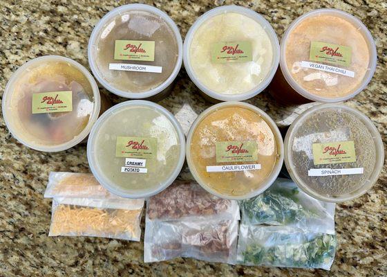 Frozen quarts of soups with bagged toppings