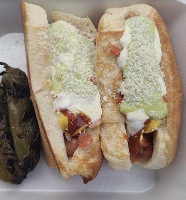 Sonora dog with frank bacon, grilled onions, guac, beans, ketchup, mustard, and mayo