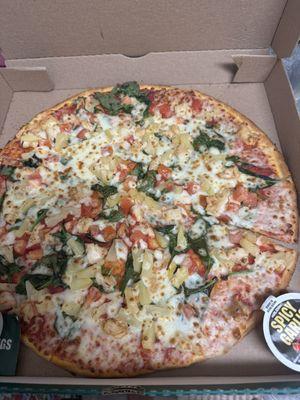 Custom large Thin crust pizza with chicken, pineapple, spinach, tomatoes.