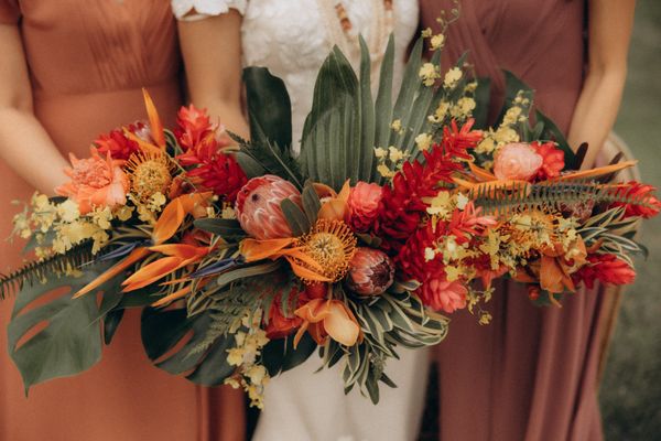 One bride bouquet and two bridesmaids bouquets.