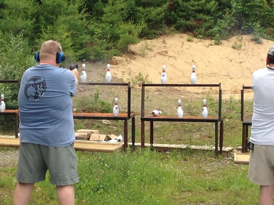 Outdoor center-fire auto pistol bowling pin shoot