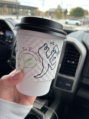 Delicious hot tea with clever barrista art!