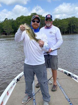 Mark Allen and my hubs holding one of his many catches of the day