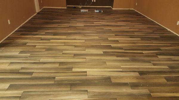 Just finishing up a porcelain tile installation in a family room. Beautiful!