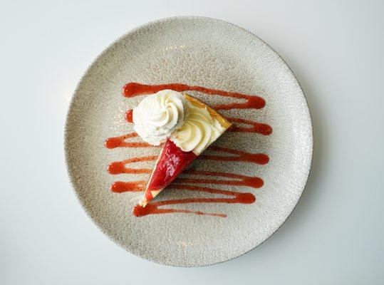 STRAWBERRY CHEESECAKE-
Strawberry sauce, whipped cream