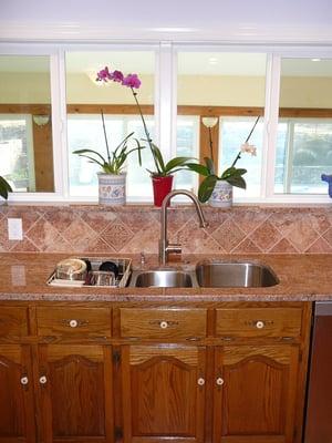 New Kitchen with Tile Backsplash, Cabinets & Windows