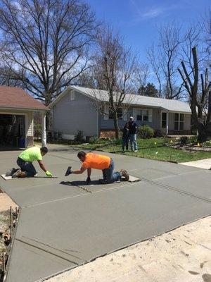 Finishing a new driveway in south county.