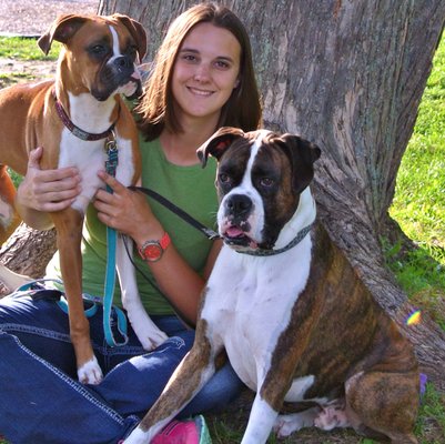 Amanda, our Master Groomer with her pack!