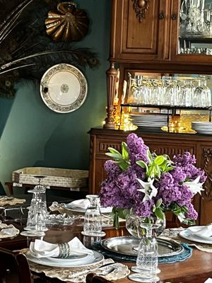 Dining room with fresh lilacs from the garden.