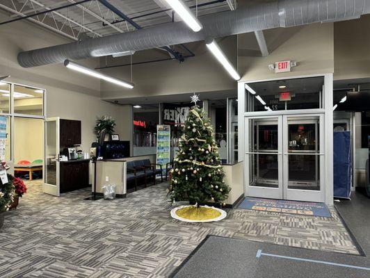 Lots of open space, well lit gym and therapy tables.