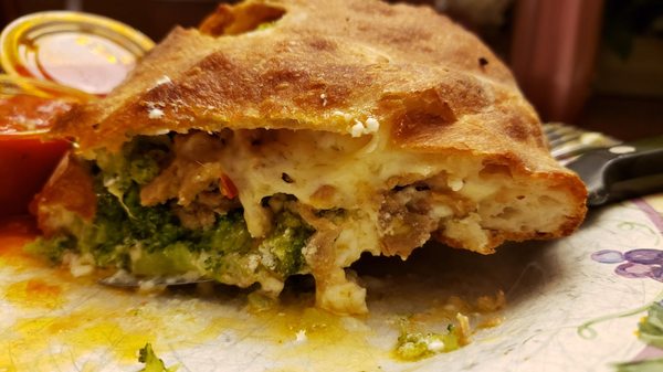 Broccoli, Sausage and Garlic Calzone..  O M G, huge, stuffed full and delicious!