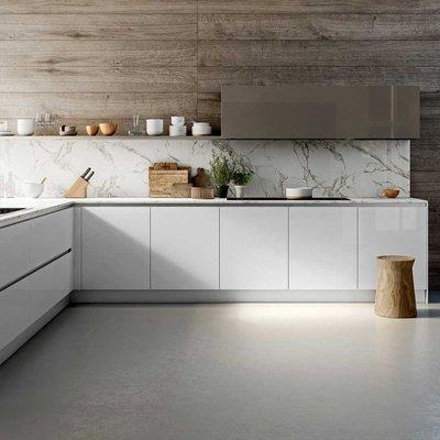 White kitchen cabinet, marble countertop and wood wall