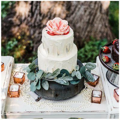 Cake stands, rose gold candle holders, dessert table