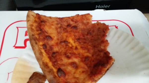 This is my burnt piece of pizza I received from them