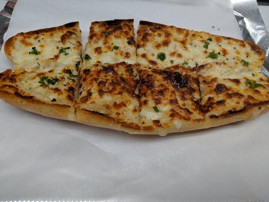 Garlic bread with cheese--made with real butter and real garlic--not oil and garlic salt like that other pizzeria.