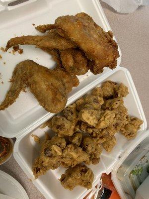 Fried chicken wings and fried gizzards. Delish