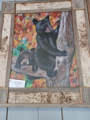 Two Cubs in a Tree done with acrylic.  Frame is made out of all North Carolina wood.