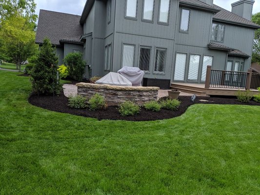 Mulch installation and yard maintenance.