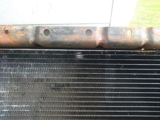 This shows how poorly the bracket was fit onto the radiator. The other side is just as bad.