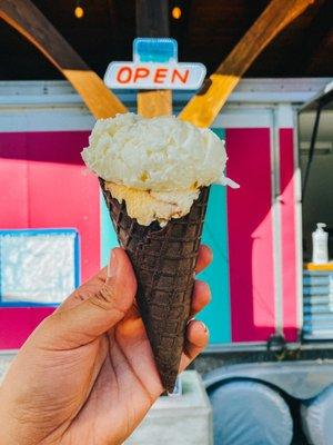 Chocolate waffle cone with coconut ice cream and coconut mango chocolate