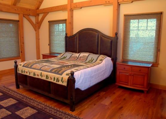 Walnut bed with leather inserts.