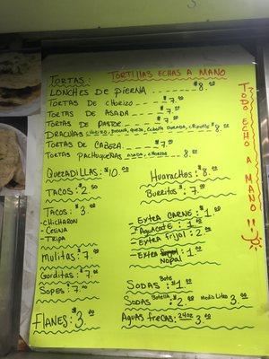 Menu Aug 2019 in addition to a white board with specials