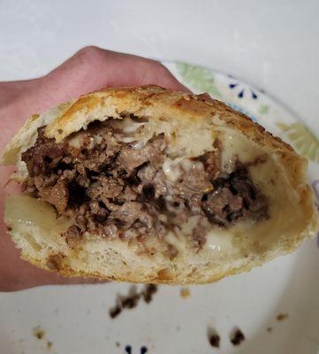 Cheesesteak, fried onions, cooper sharp