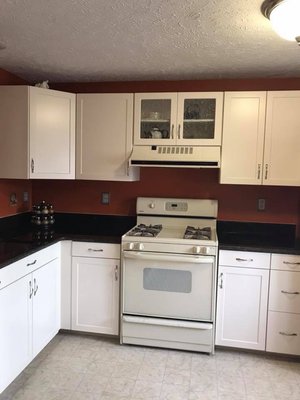 After: Doors are super easy to clean. And the counter tops are not pink! And the doors are easier to clean. :D