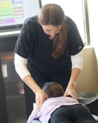 Dr. Baise performing a child adjustment