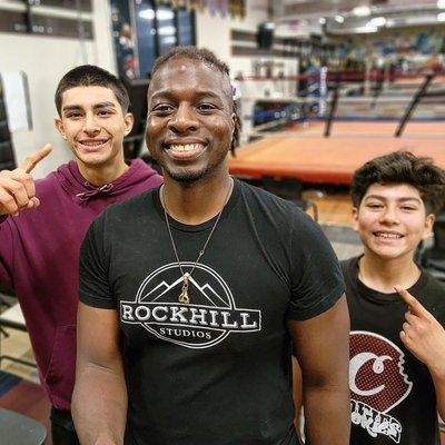 LtoR youth boxer Ricardo, Asst. Amateur team coach,  Bernard and youth boxer Xavier