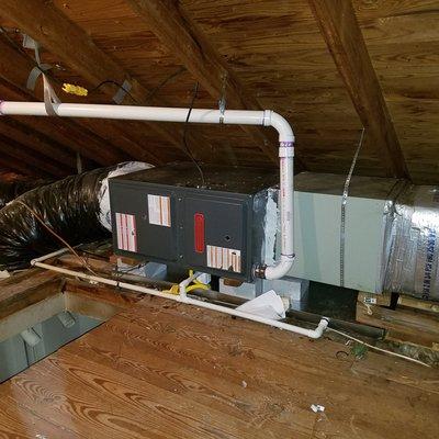 97% AFUE GOODMAN gas furnace in an attic.
Job comes with secondary drain pan, float switch, PVC vent pipe.