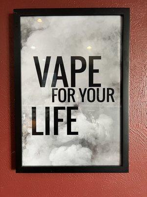 A picture hanging on the wall of VaporizeIt 1488