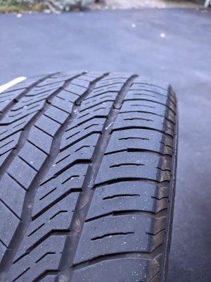 Note wear on extreme right edge of tread