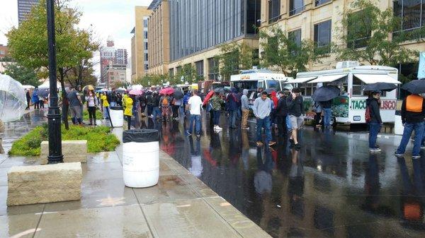 Crowd and lines in the rain.