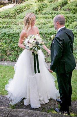 Our stunning Real Bride Jenny at her elegant garden wedding wearing our Olivia gown