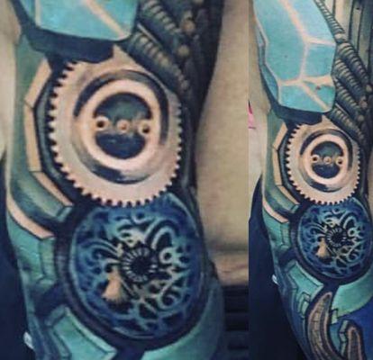 Mechanical close up of sleeve tattoo.