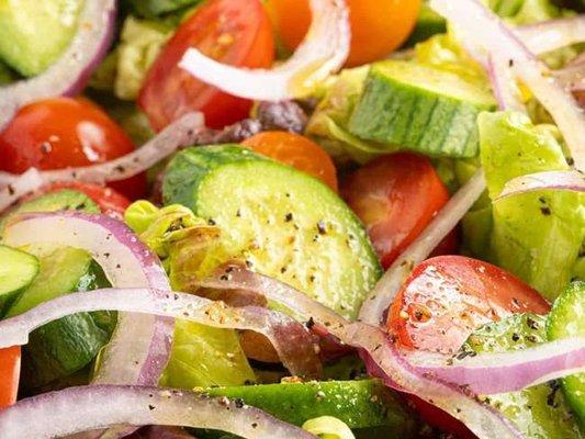 Ensalada Verde / Green Salad: Fresh greens, cucumbers, tomatoes, red onions, vinaigrette dressing