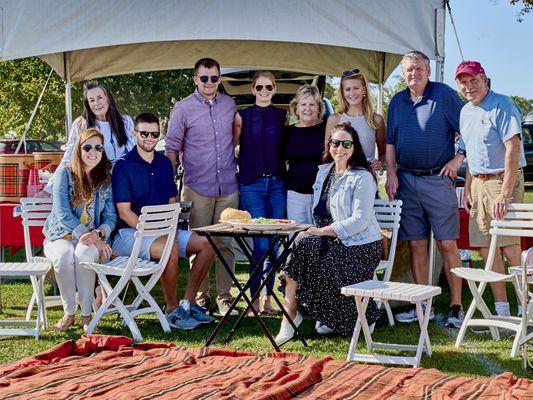 Tailgaters enjoy a field-side picnic during a Newport International Polo Series public exhibition match.