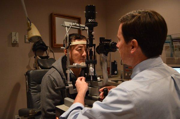 Dr. Williams performing an eye exam